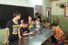 Volunteer Teaching Boys Math in Vietnam