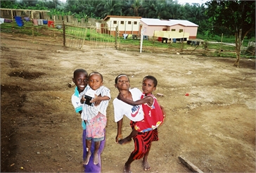 Ghana Volunteer Kaitlyn Scott Carrying Kids